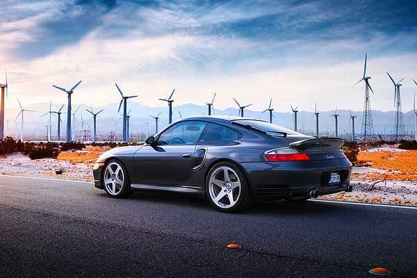996-911 in front of wine turbines