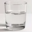 half full glass of water, symbolising that although AI hurts brand loyalty, it helps marketing